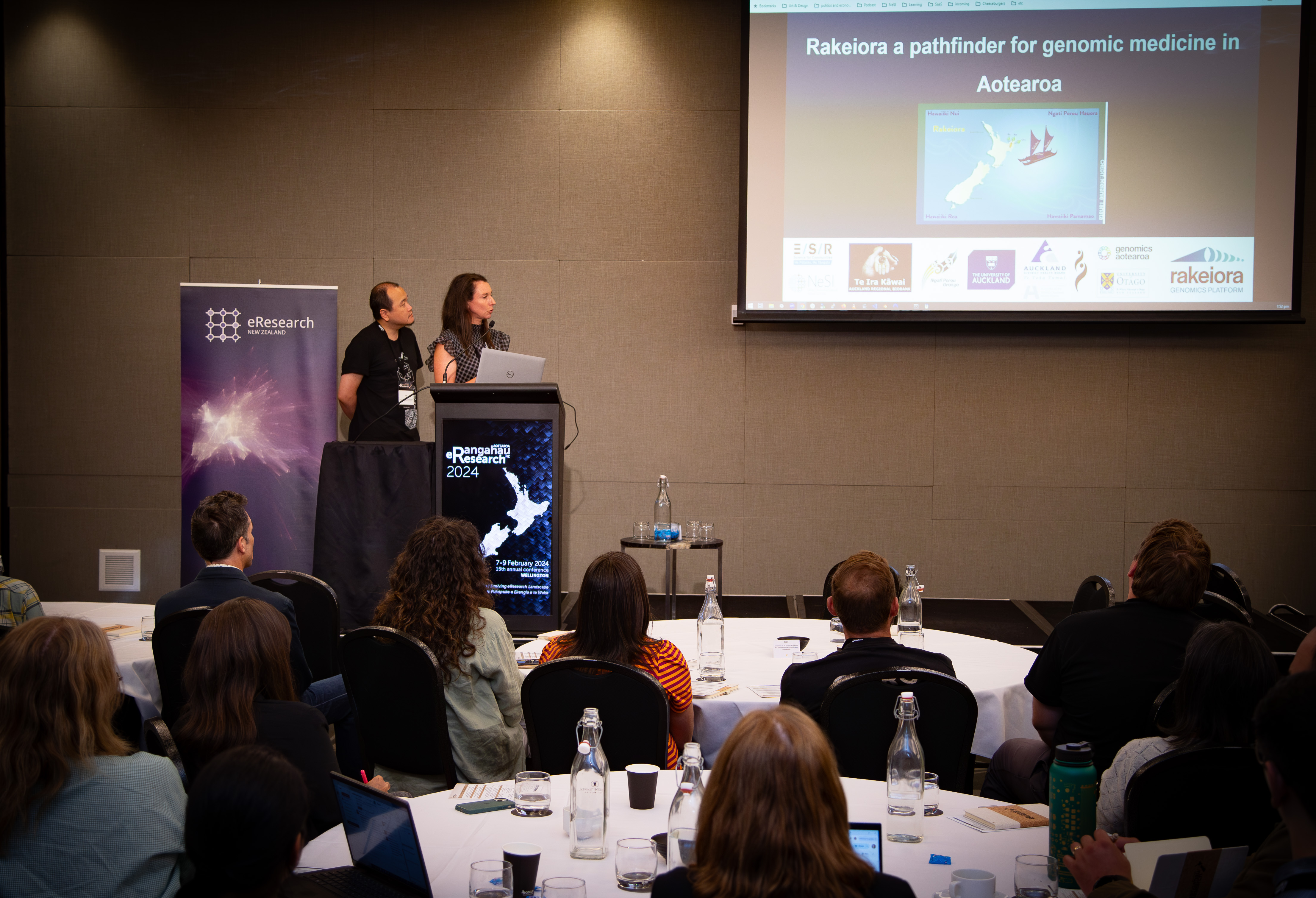 Claire Rye and Jun Huh from NeSI presenting on the Rakeiora pathfinder project.
