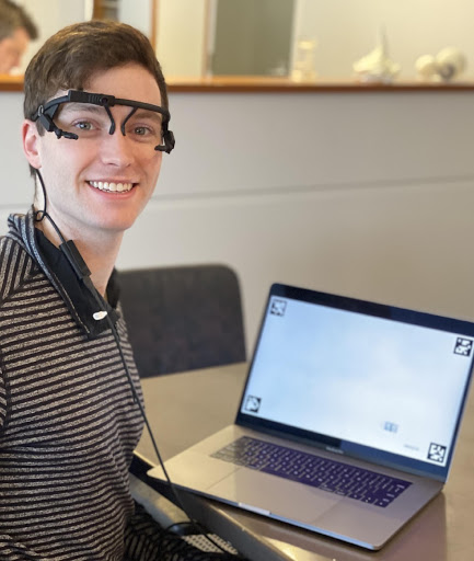 Photograph of Matt McDonald wearing the eye-tracking glasses.