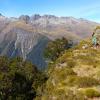 Calum Chamberlain servicing the Solution Ranges seismic site above the Landsborough Valley.  